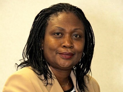 Rita Kavashe briefs Gangla Oduor why modern Isuzu buses are the best